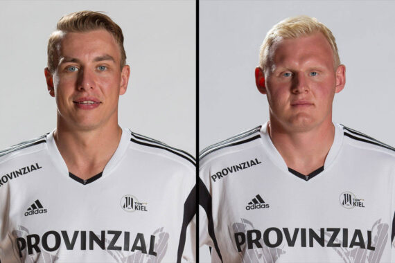 Zwei Männer in weißen und schwarzen Sporttrikots mit der Aufschrift PROVINZIAL auf der Vorderseite stehen vor einem schlichten Hintergrund; beide schauen nach vorne in die Kamera.