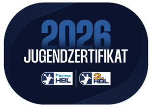 Ein blaues ovales Abzeichen mit 2026 JUGENDZERTIFIKAT in großer weißer Schrift und zwei Logos darunter: Daikin HBL und 2. HBL, die jeweils eine weiße Figur zeigen, die Handball spielt, was das Engagement für die Jugend- und Nachwuchsförderung unterstreicht.