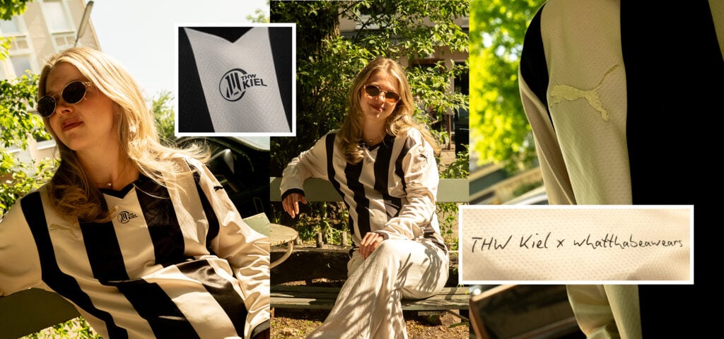 Header_THW-KielxwhatthabeawearsHeader_thabe Eine Frau mit Sonnenbrille und einem schwarz-weiß gestreiften Trikot sitzt auf einer Bank im Freien. Nahaufnahmen zeigen das THW Kiel-Logo, das Puma-Logo und den Schriftzug THW Kiel x whattheshawears auf dem Shirt.